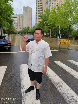 政协委员孙焕文:大雨中的“爱心行走”